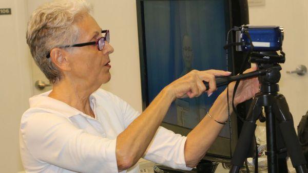 Sara Rogers coaching a student on camera